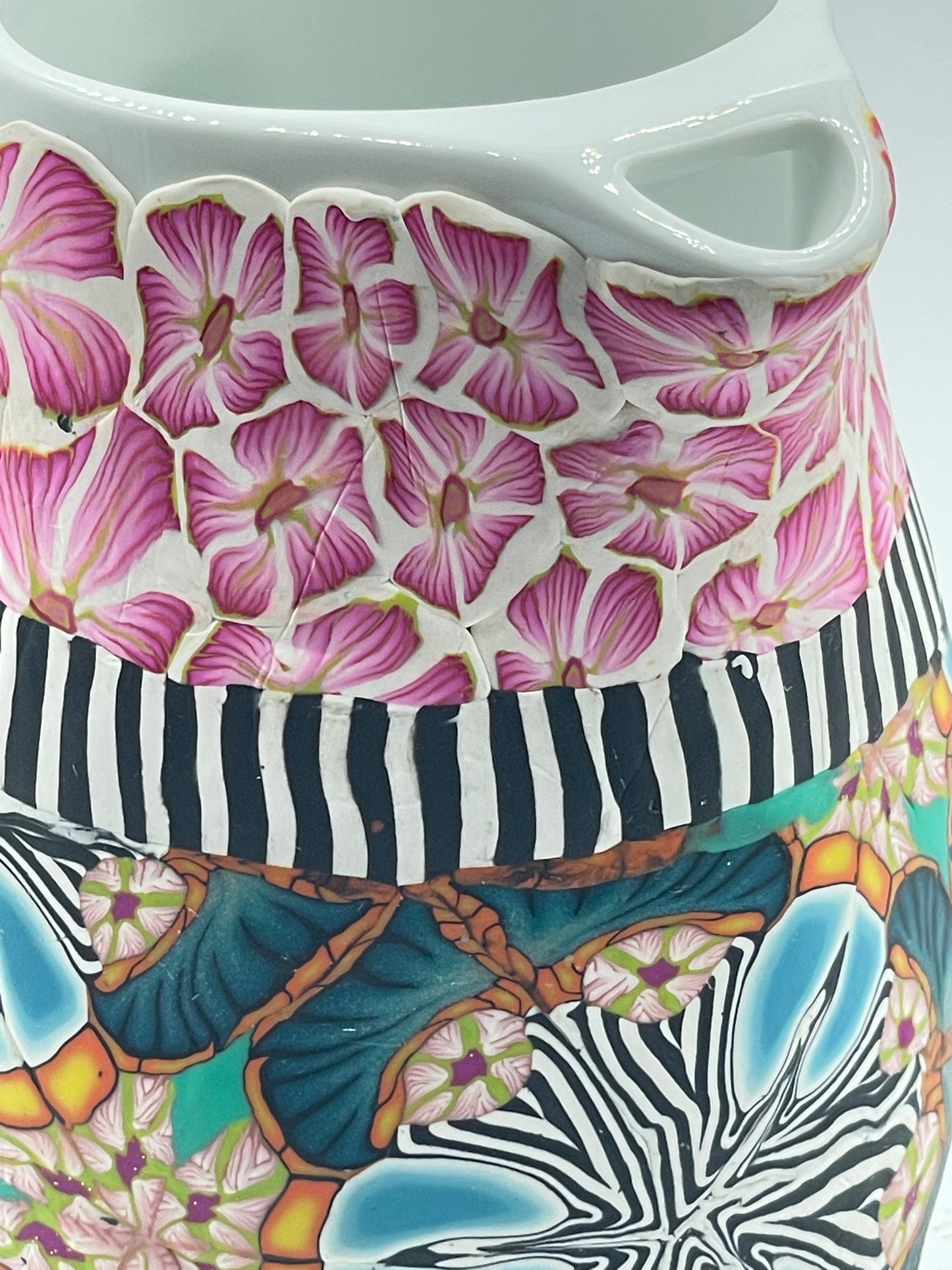 Small polymer clay covered pitcher