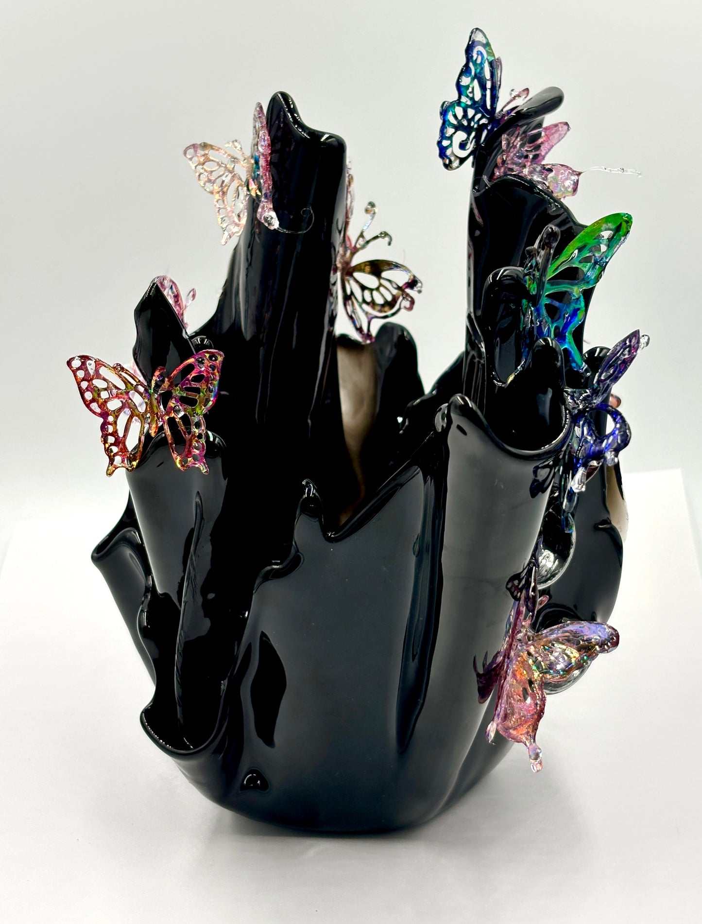 Black resin sculpture vase with butterflies