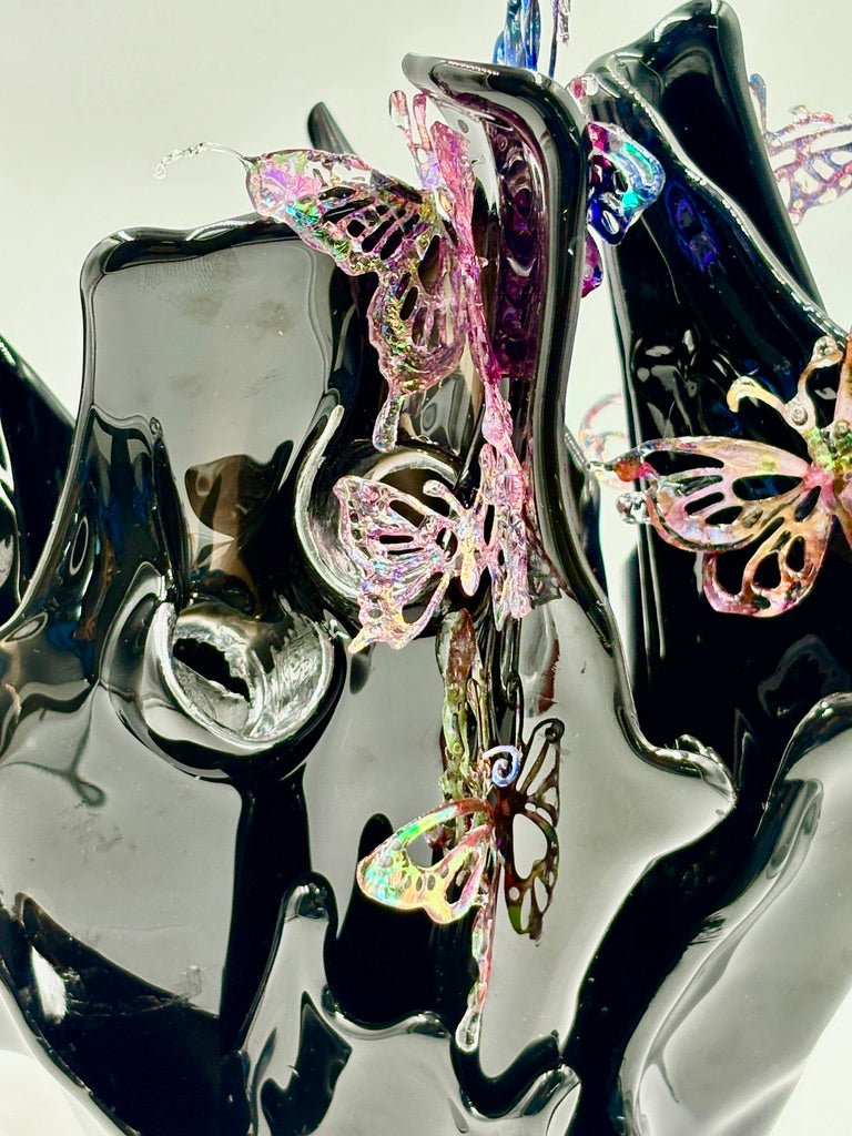 Black resin sculpture vase with butterflies