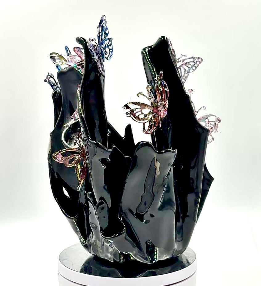 Black resin sculpture vase with butterflies