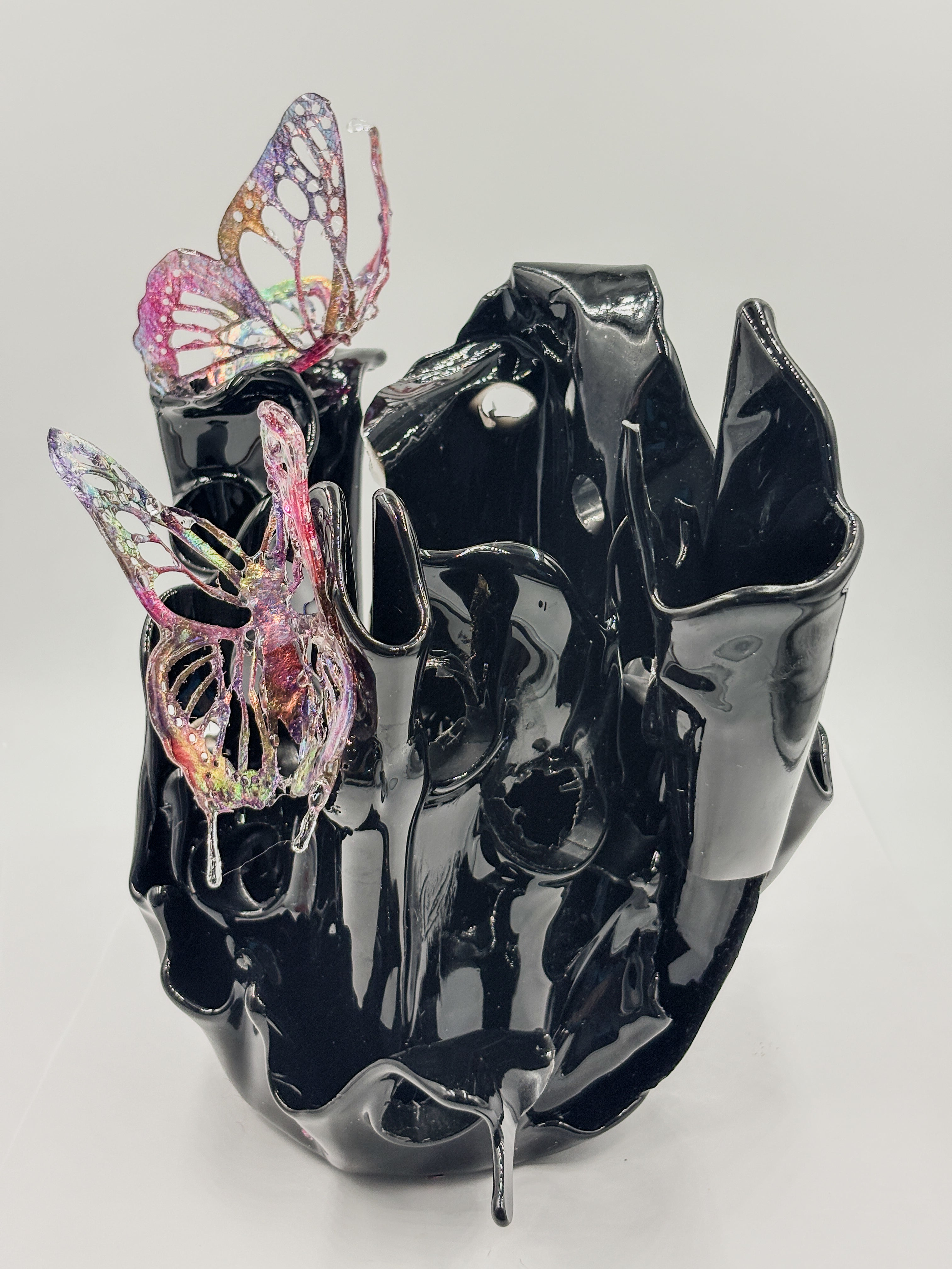 Black resin sculpture vase with butterflies