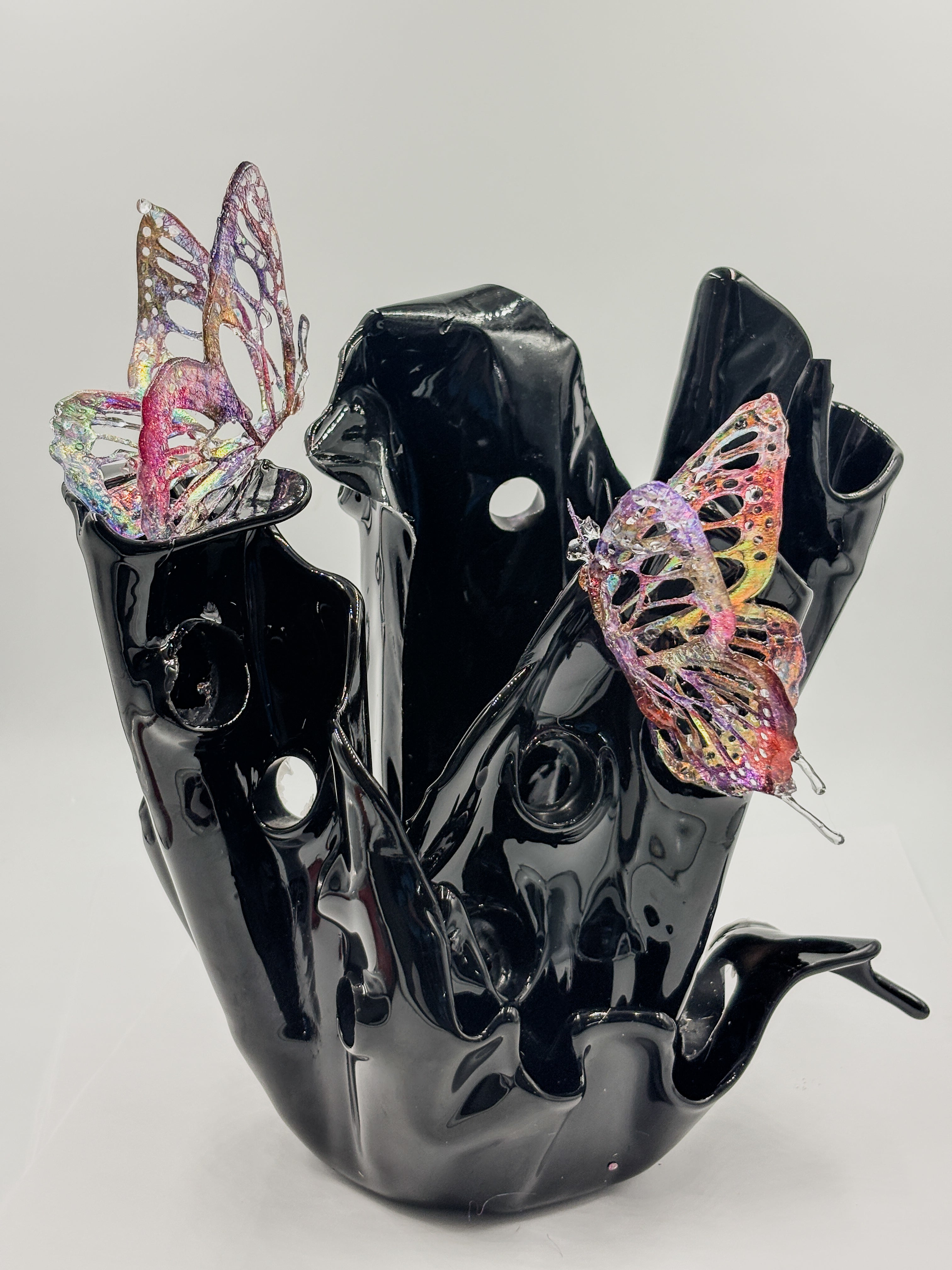 Black resin sculpture vase with butterflies
