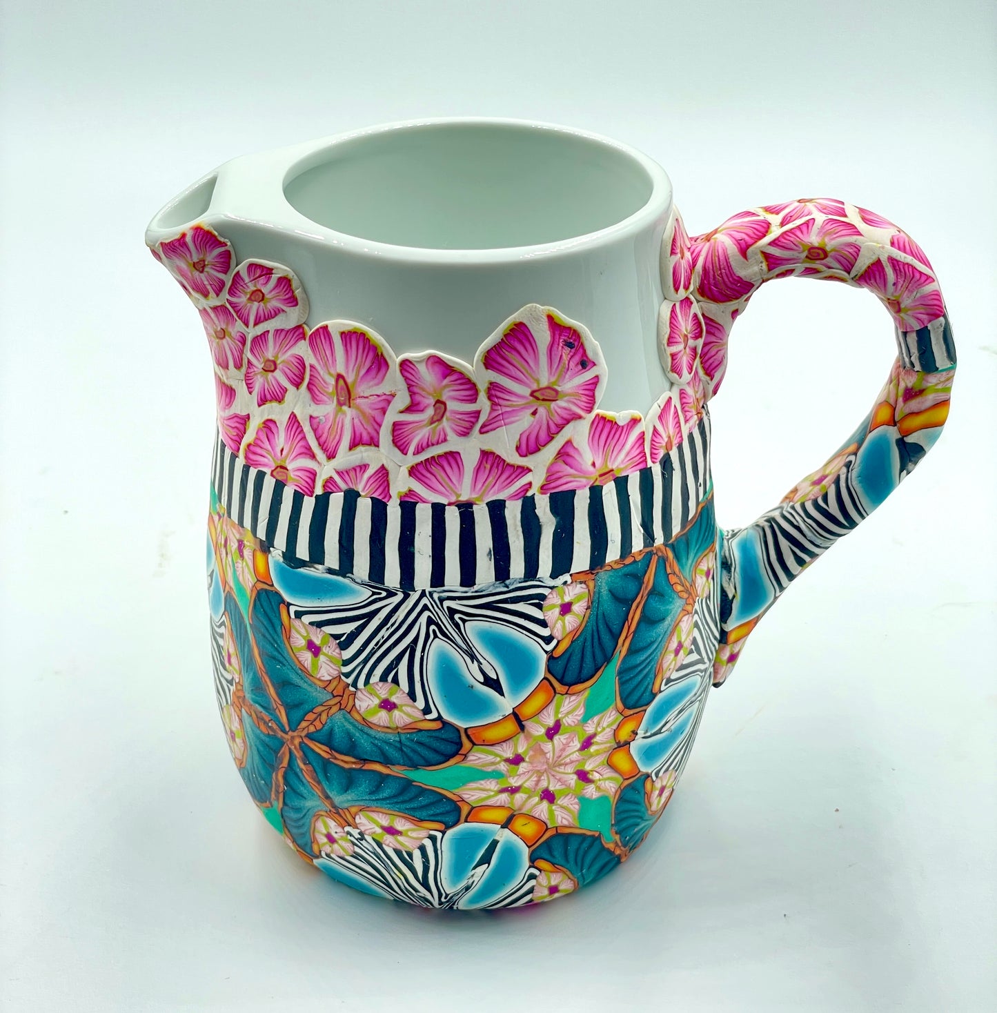 Small polymer clay covered pitcher